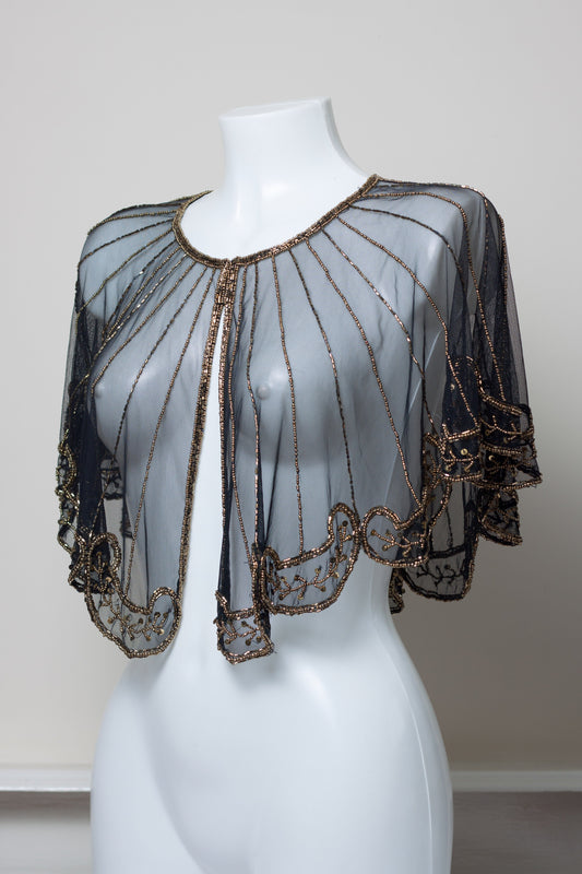 capelet with sequins all over
