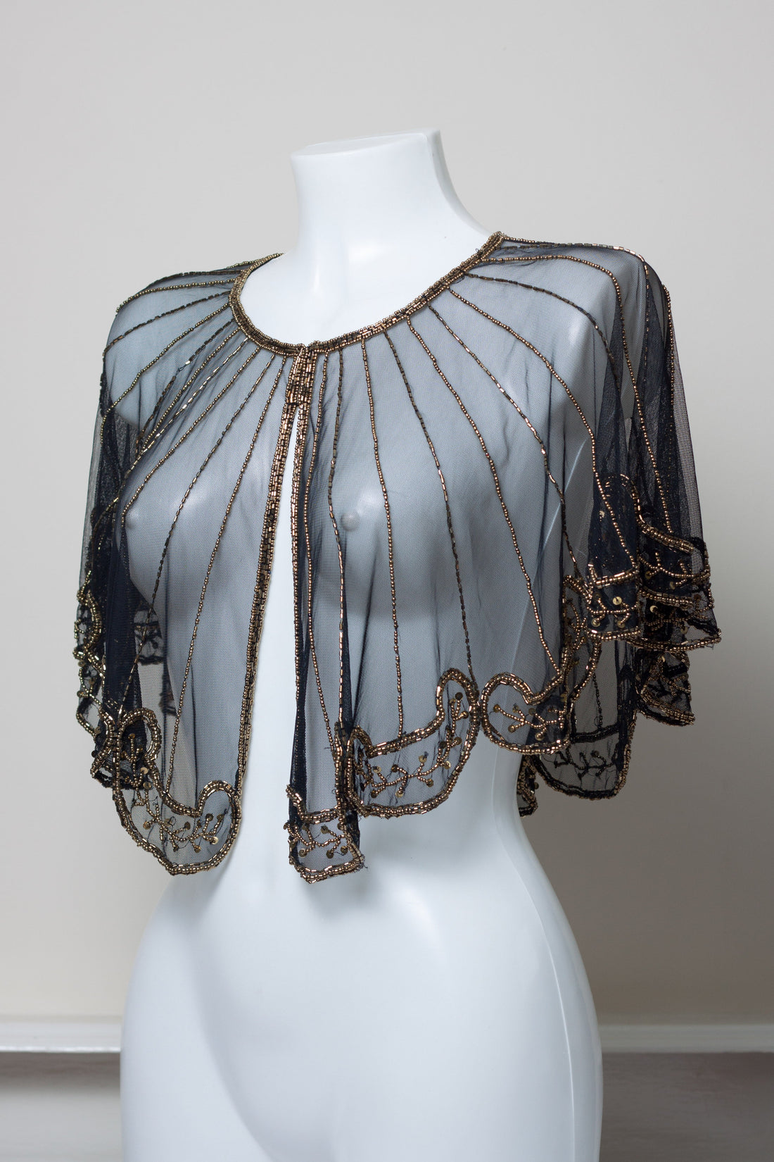 capelet with sequins all over