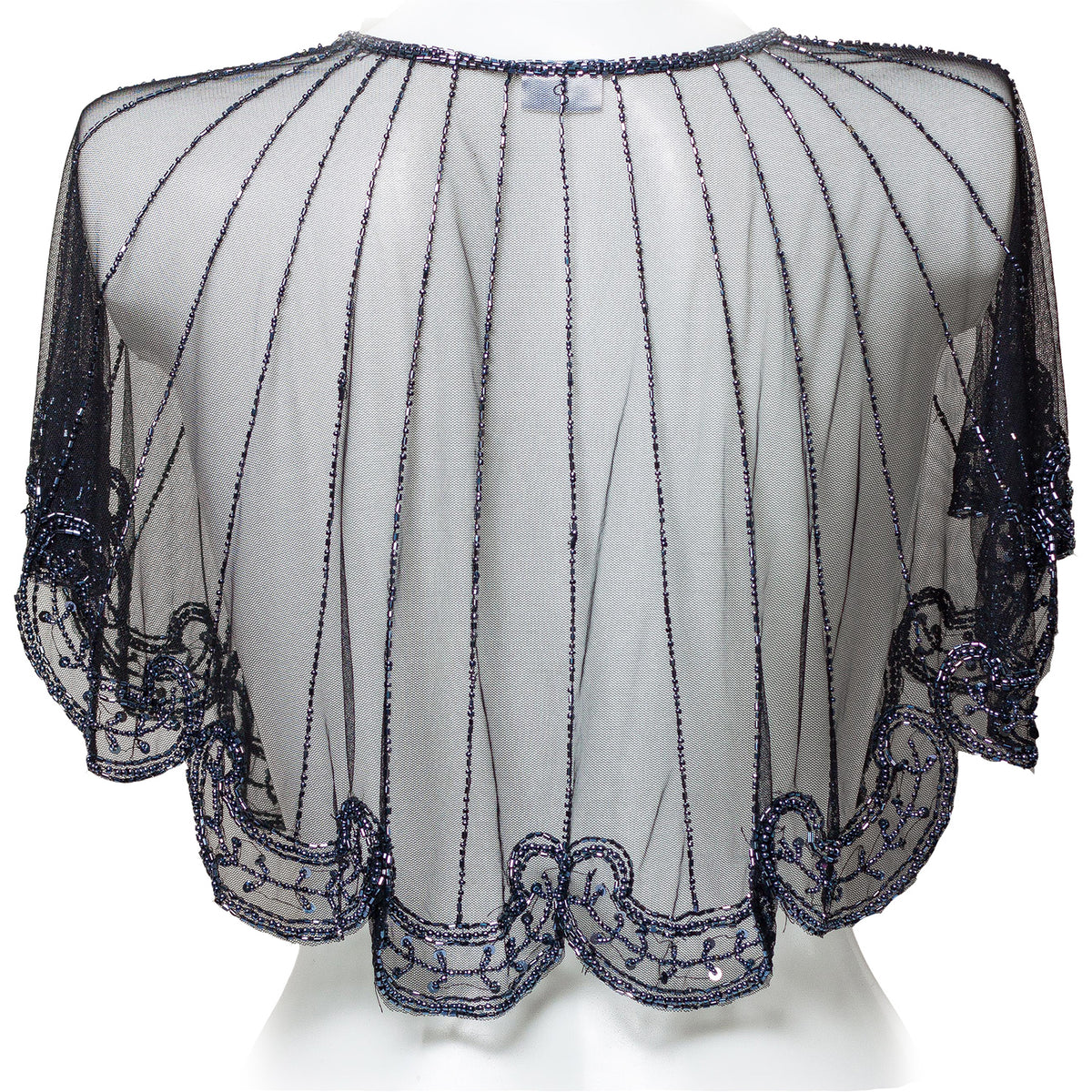 White blouse with black beaded details on a white background