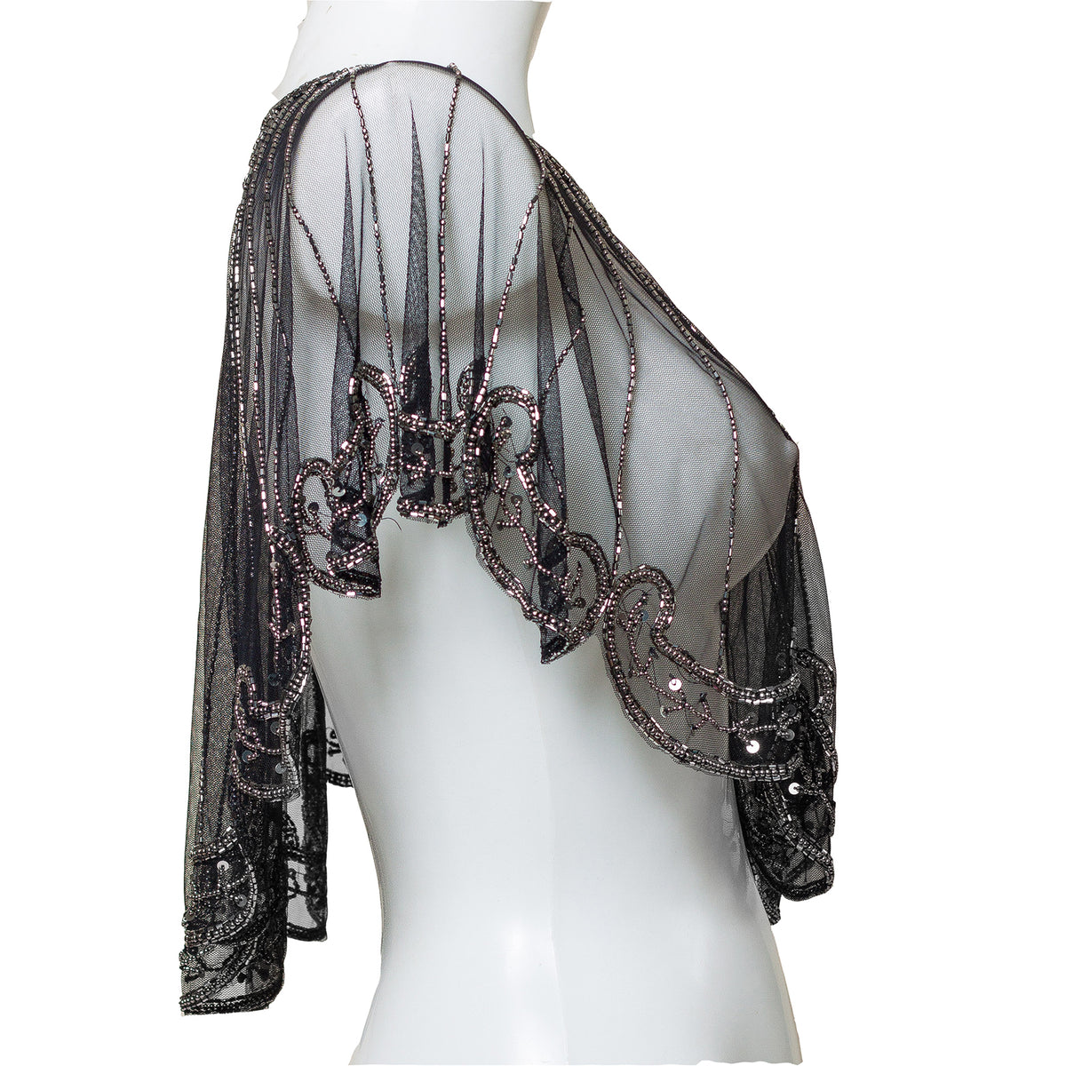 Black beaded capelet on a mannequin against a white background