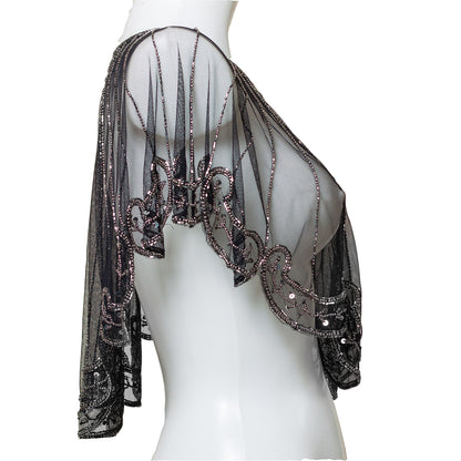 Black beaded capelet on a mannequin against a white background