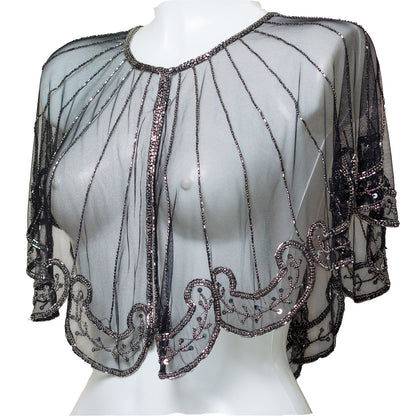 Black beaded shrug on a mannequin against a white background