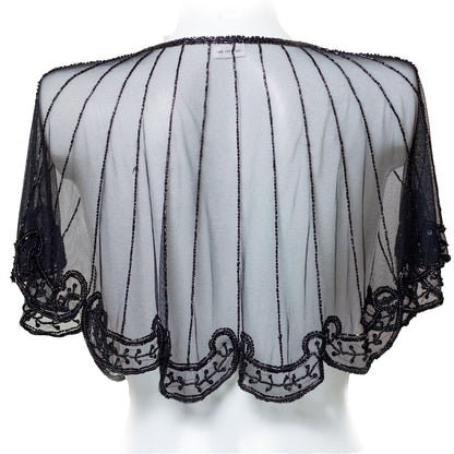 Black lace shrug on a mannequin against a white background